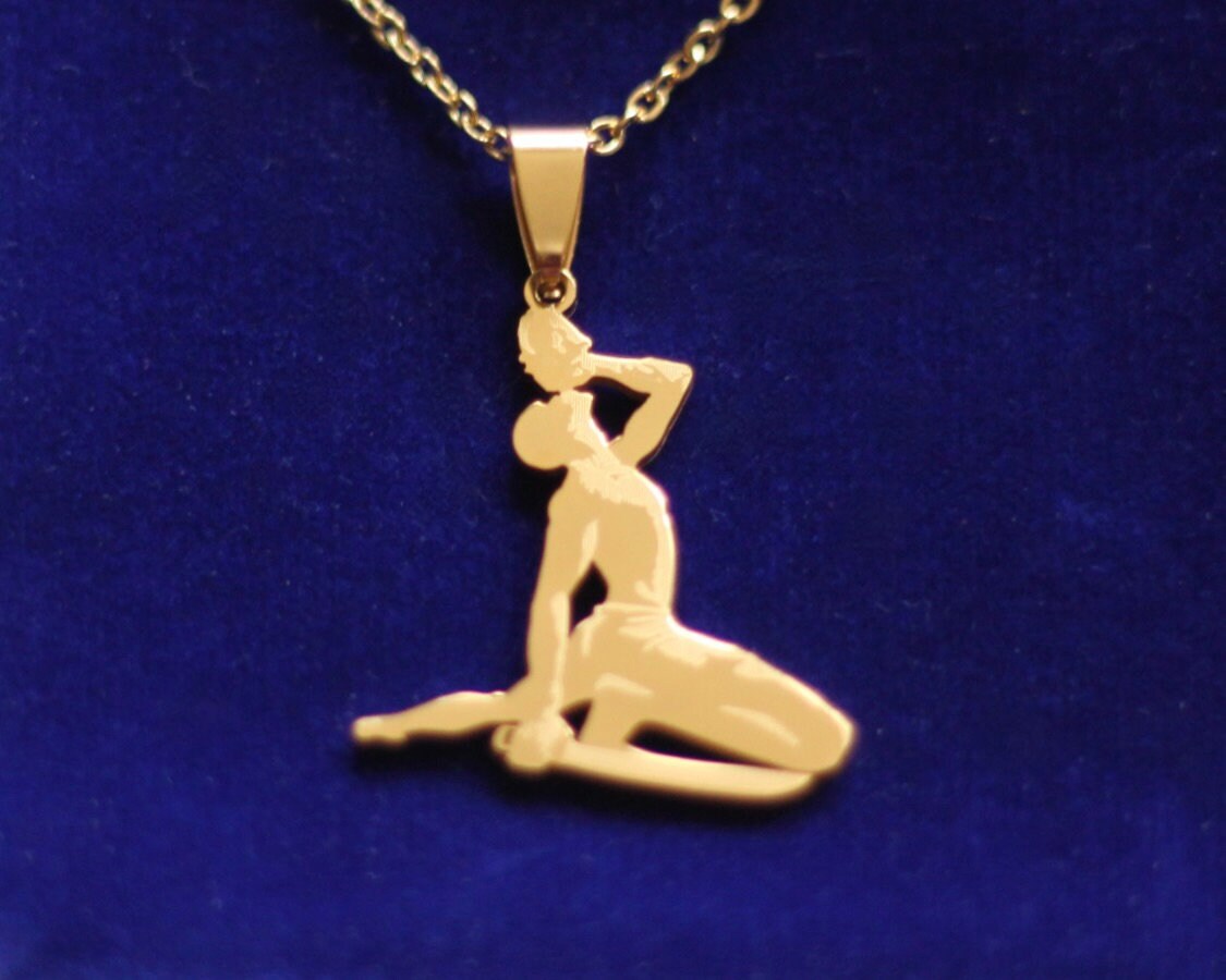 Le Marron Inconnu Haiti Pendant Necklace with Gift Pouch, Gold Stainless Steel