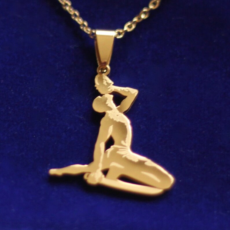 Le Marron Inconnu Haiti Pendant Necklace with Gift Pouch, Gold Stainless Steel